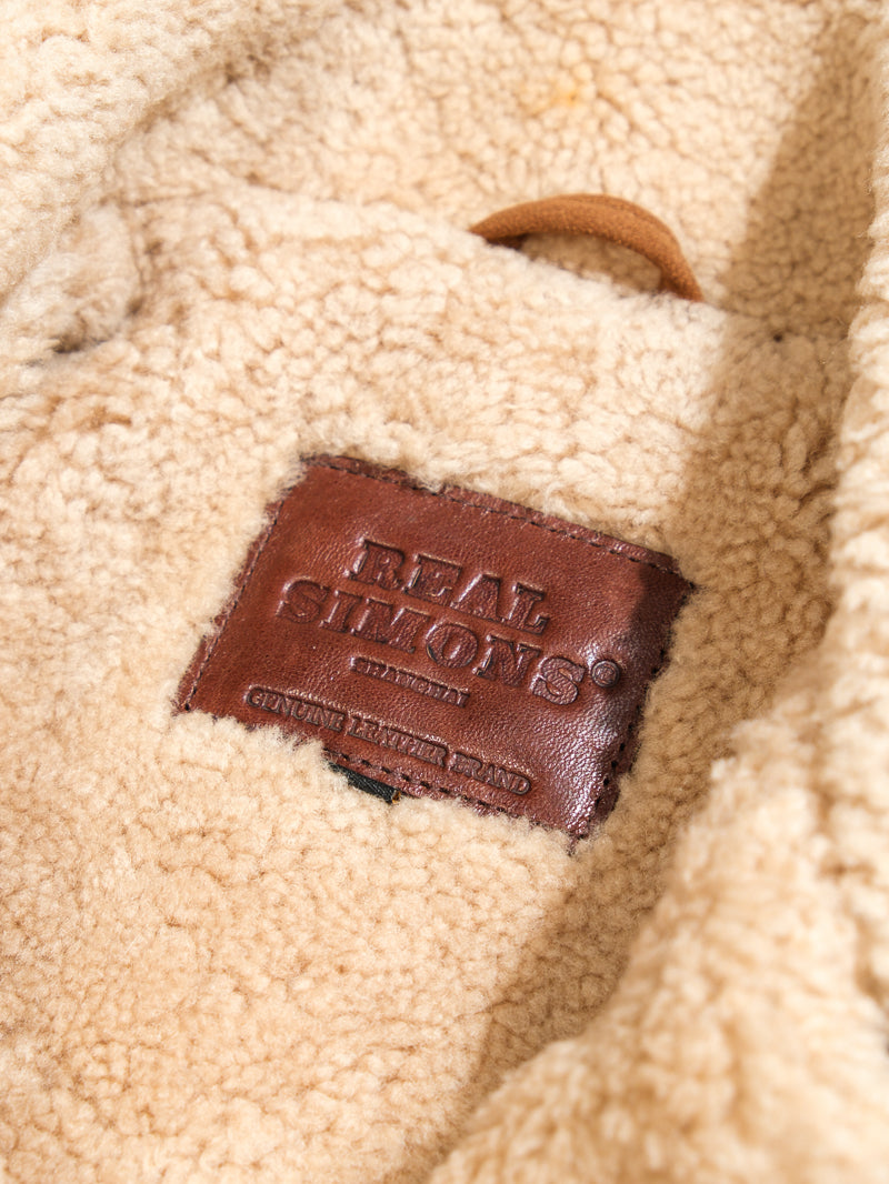 Brown logo on the farmers leather jacket