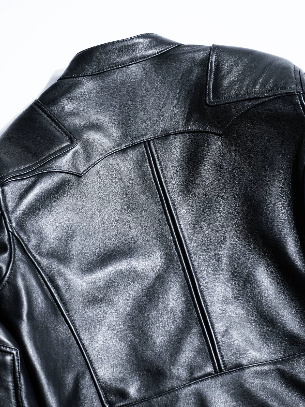BRIXTON black jacket back and shoulder seam detail, studio shot