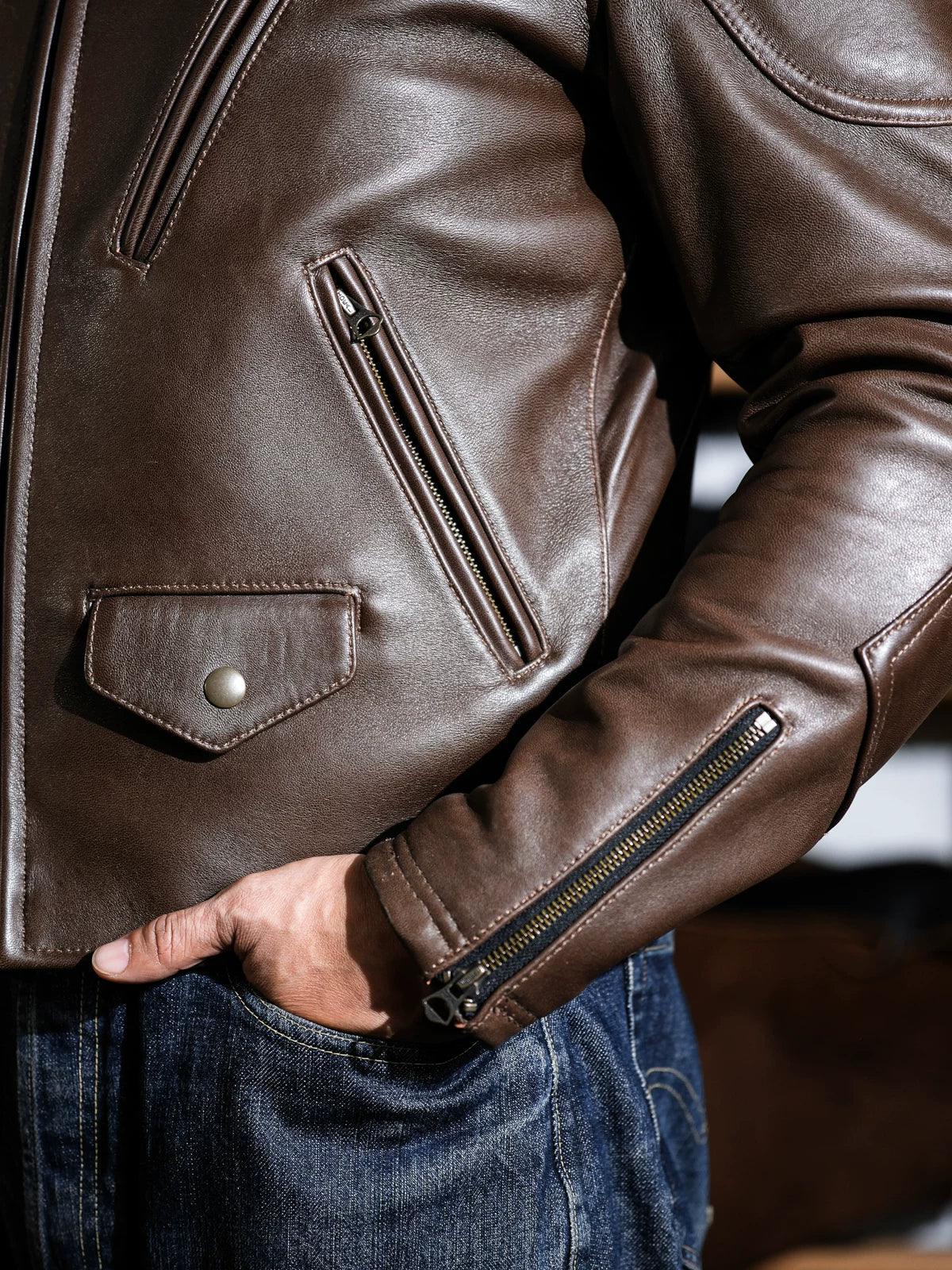 BRIXTON brown jacket front detail with flap pockets and zipped cuffs