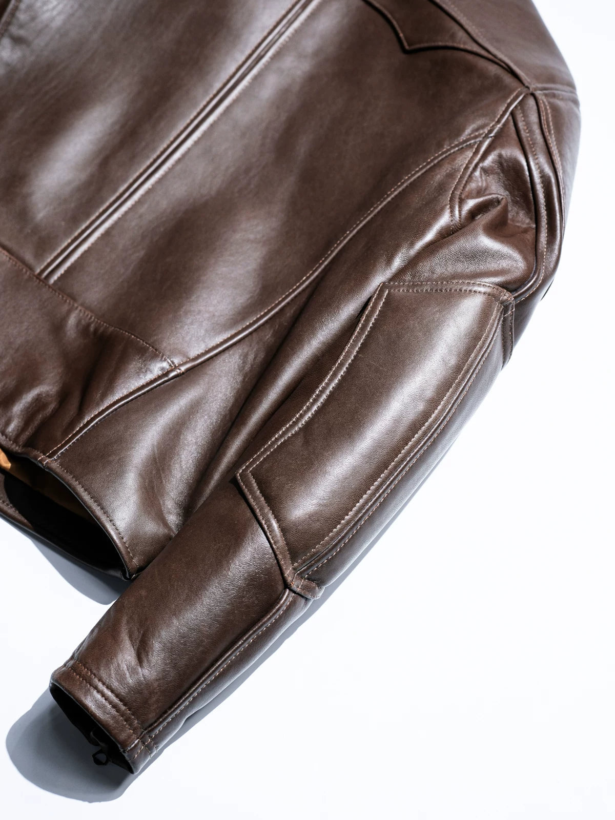 BRIXTON brown jacket shoulder and sleeve seam detail, studio shot