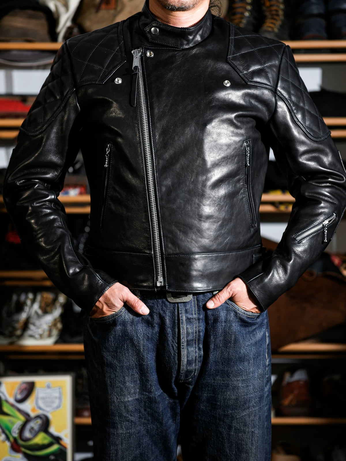 Real Simons MALLORY British racing jacket IMOLA in black oiled-wax calfskin, front view with diamond-quilted shoulders and offset zipper