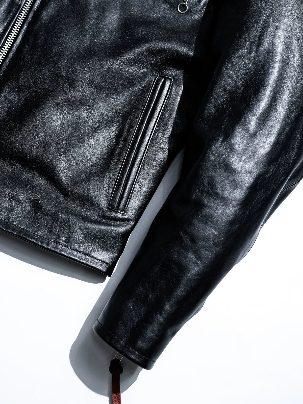 Mojave jacket side pocket and sleeve detail with ring pulls