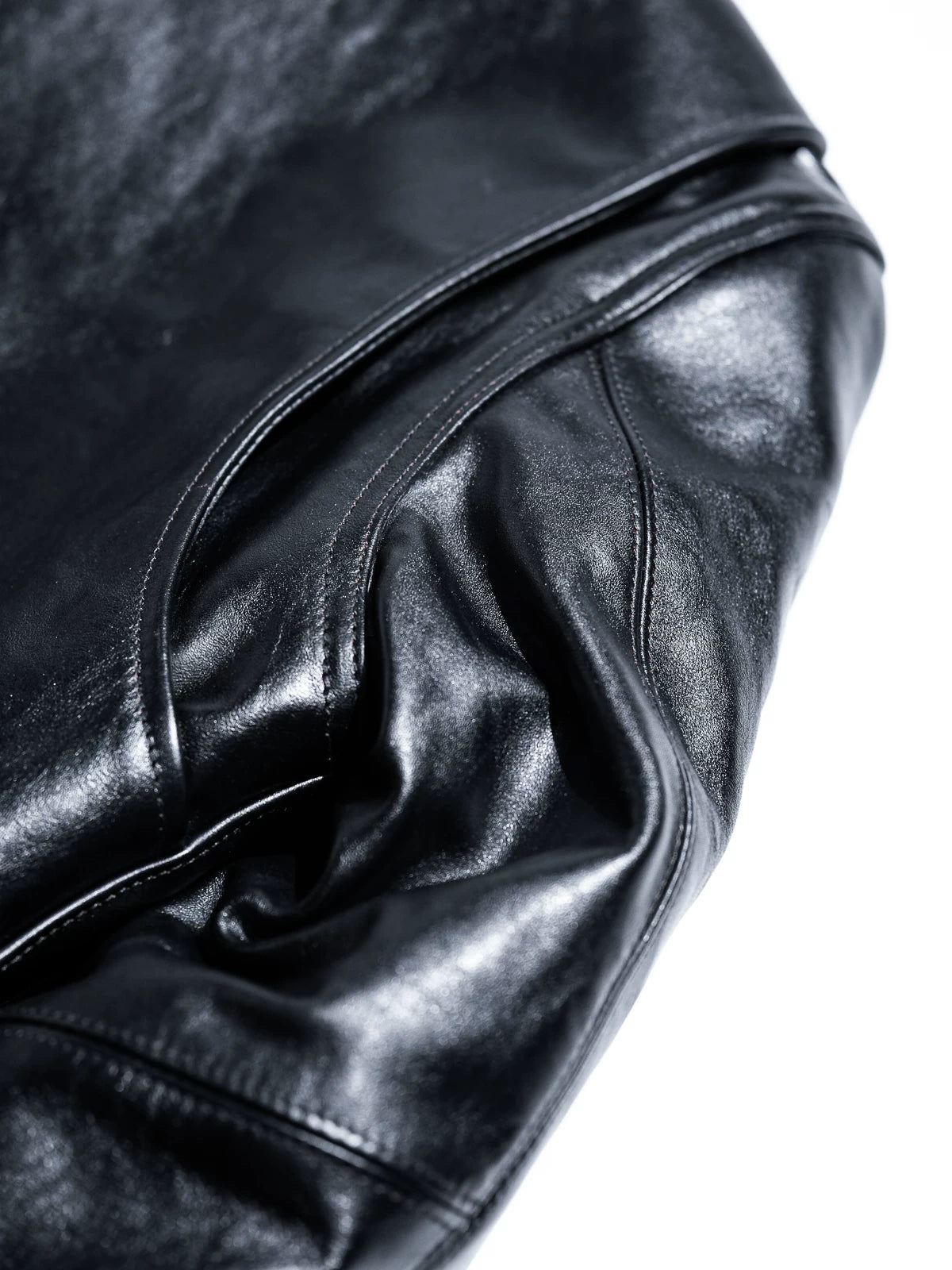 Leather grain and stitching detail on the Mojave jacket
