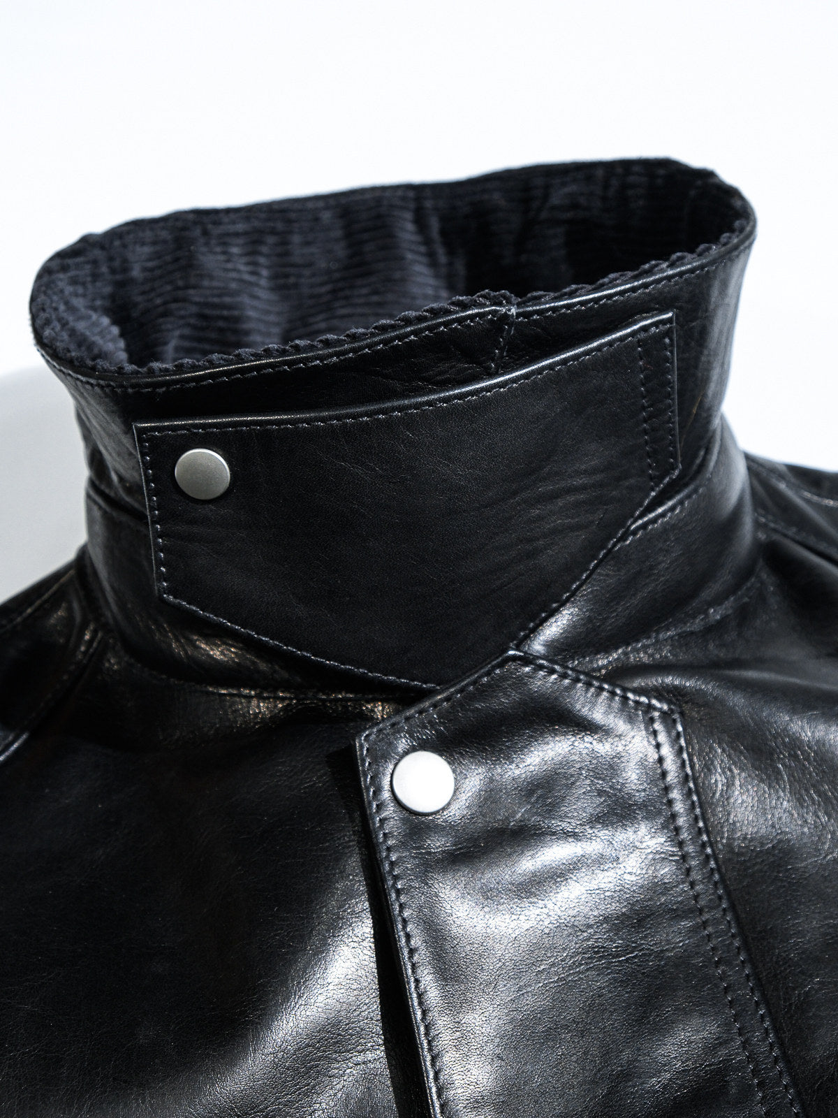 Transport jacket hardware details - MILDEX snap, IDEAL two-way zipper and tartan cotton lining