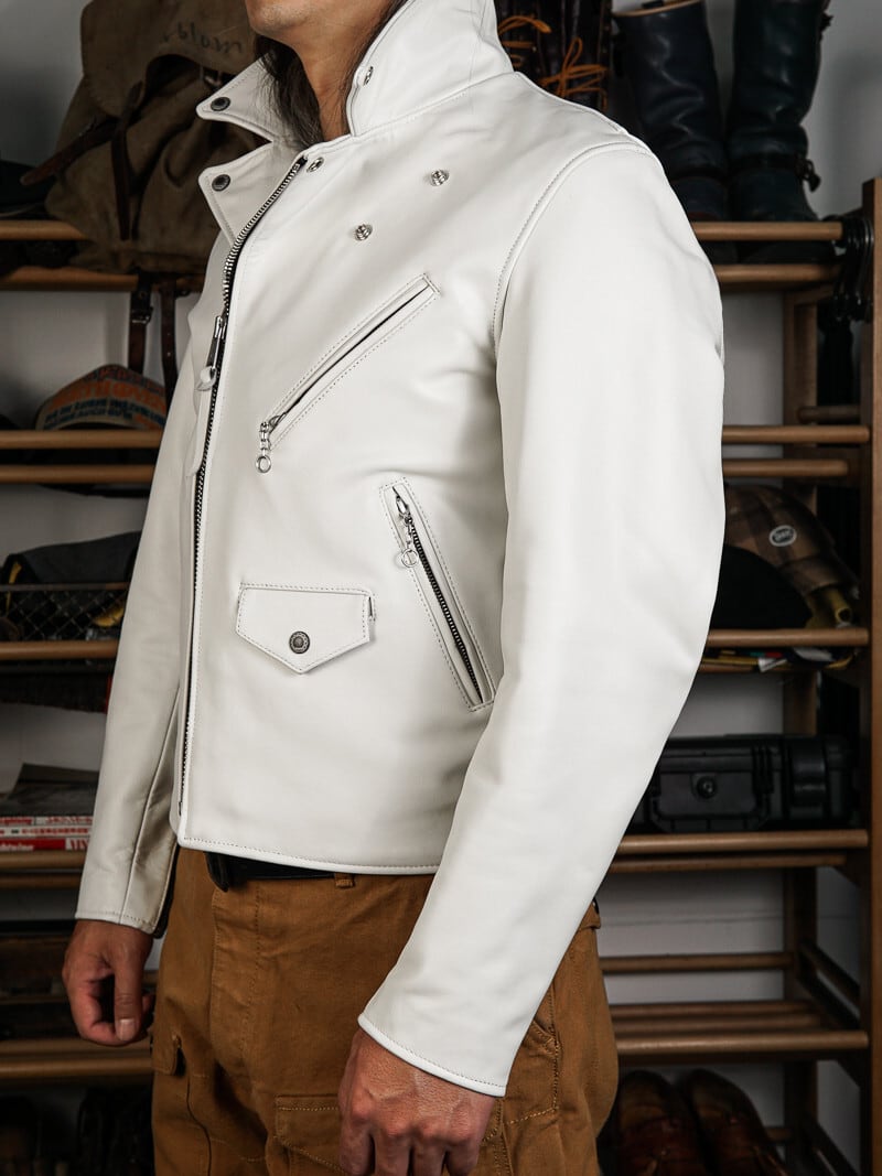 Urban riders beltless jacket in white horsehide worn with work pants, front view