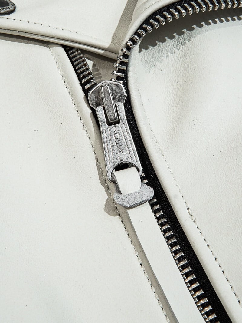 IDEAL zipper detail on the white horsehide jacket