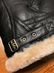 Black-sheepskin-jacket-with-belt-detail-on-back