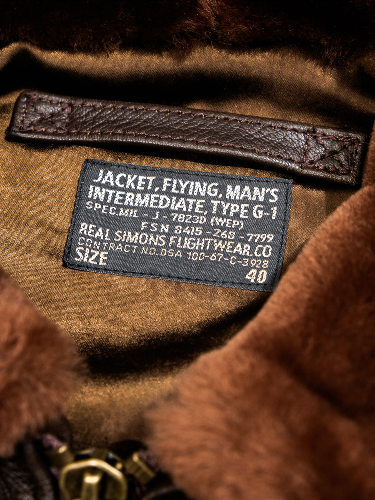Brown-G1-bomber-jacket-with-woven-label
