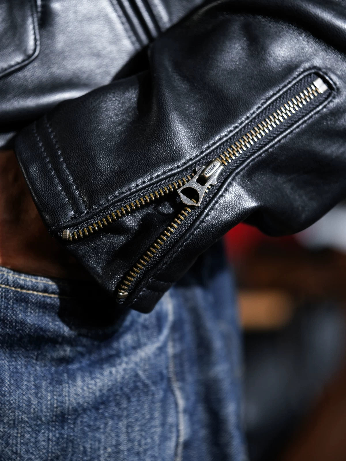 BRIXTON jacket cuff detail with metal zipper and branded pull