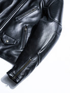 BRIXTON black jacket sleeve and chest pocket detail with zippers