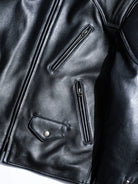 BRIXTON padded racing jacket in black sheepskin, front detail with zip and flap pockets