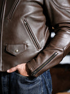 BRIXTON brown jacket front detail with flap pockets and zipped cuffs