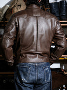 Rear three-quarter view of BRIXTON brown jacket with elbow panels and back seams