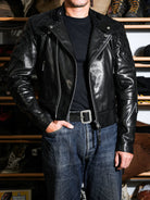 MALLORY IMOLA racing jacket styled with blue denim, front three-quarter look in black oiled-wax calfskin