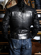 Rear three-quarter view of the MALLORY IMOLA racing jacket with quilted upper sleeves and side buckle adjusters