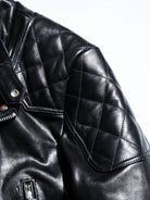 MALLORY IMOLA jacket shoulder panel detail with diamond quilting and vintage metal hardware