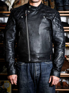 MALLORY IMOLA jacket in tea-core cowhide worn open, showing stand collar, quilted shoulders and zippered pockets