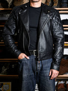 MALLORY IMOLA tea-core cowhide jacket styled with denim, three-quarter front view with leather-tab zipper pulls