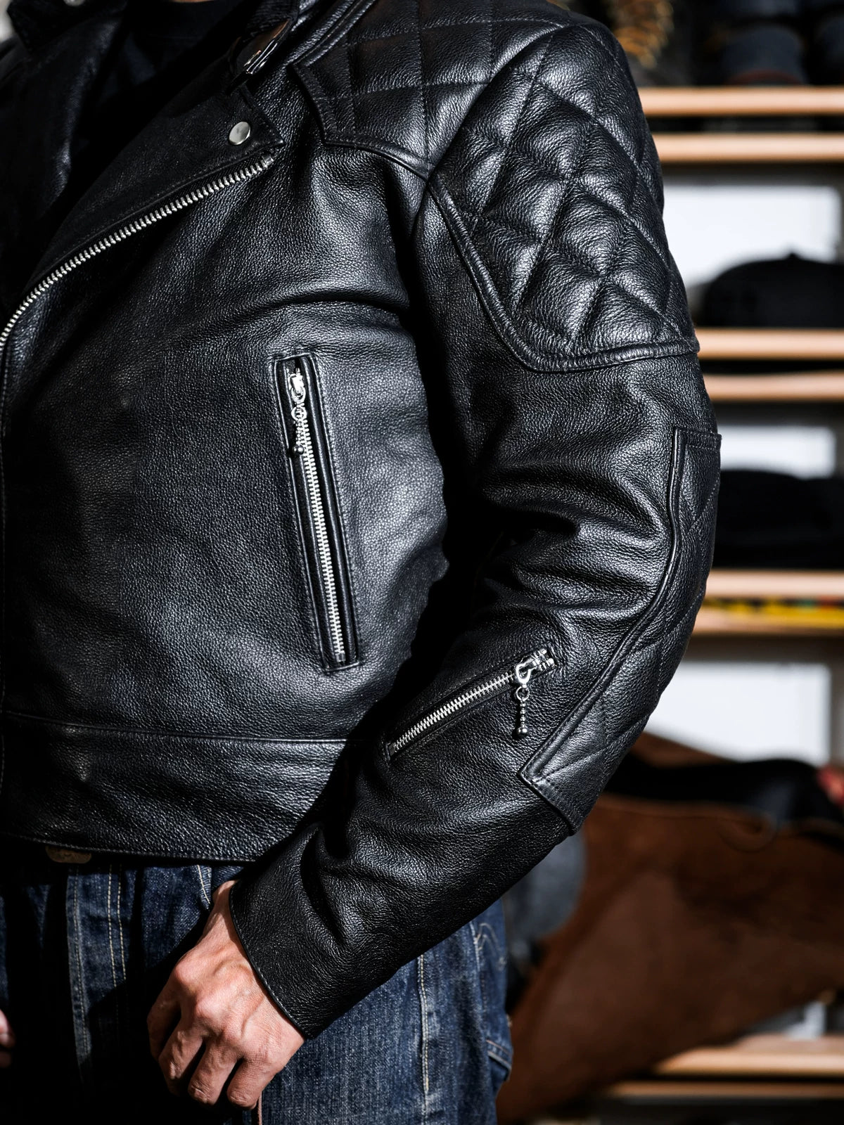 MALLORY IMOLA shoulder and sleeve detail with diamond quilting and zippered pockets