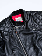 Close-up of the MALLORY IMOLA label and leather-tab zipper pull