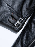 MALLORY IMOLA double-snap leather adjuster strap with metal buckles, brown core visible at the edges