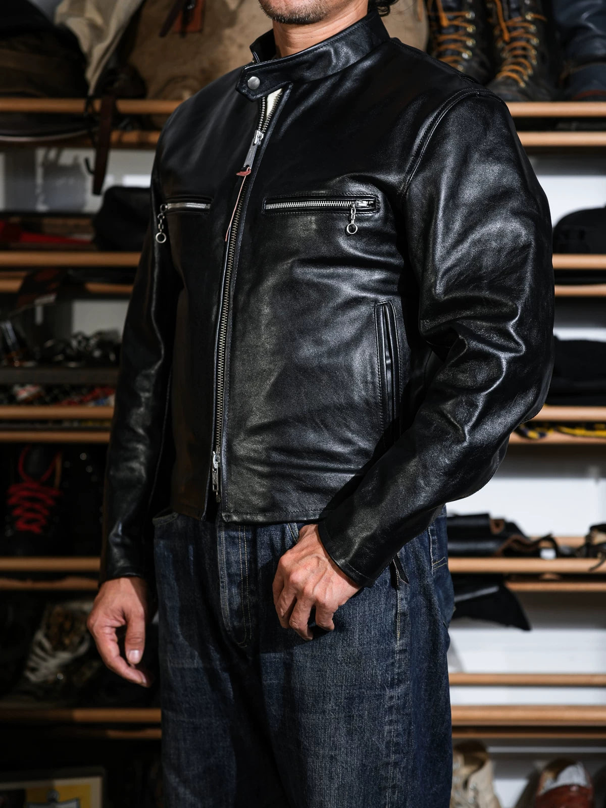 Mojave single-rider racing jacket side view styled with denim