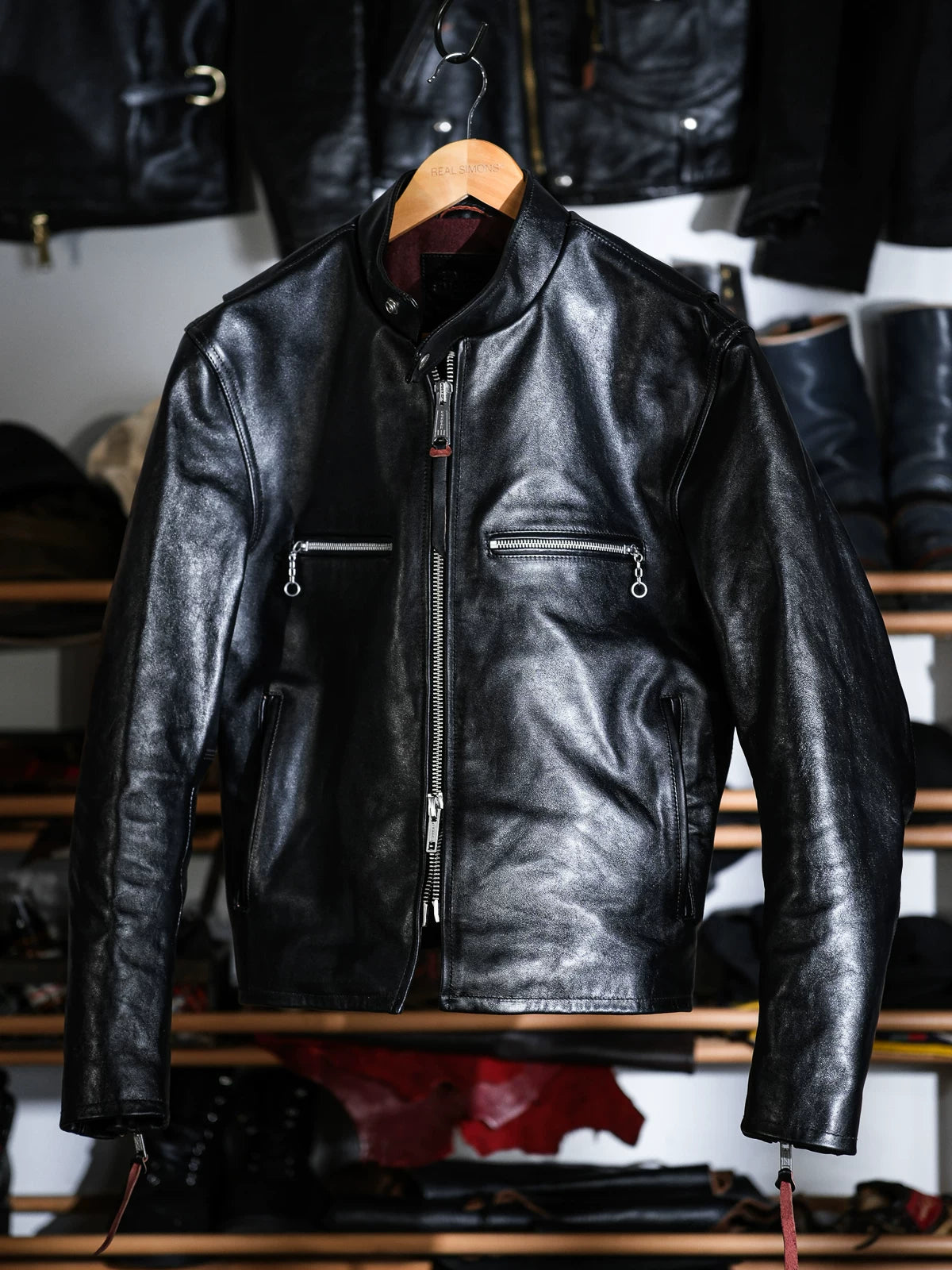 Mojave racing jacket in tea-core horsehide on a hanger, front view