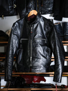 Mojave racing jacket in tea-core horsehide on a hanger, front view
