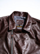 Flat lay stand collar with diagonal engraved zipper pull on chestnut seal brown horsehide