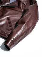 Sleeve panel construction and natural patina on seal brown water-dyed horsehide