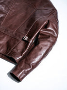 Back yoke and side waist adjuster strap with antique silver buckle on seal brown horsehide