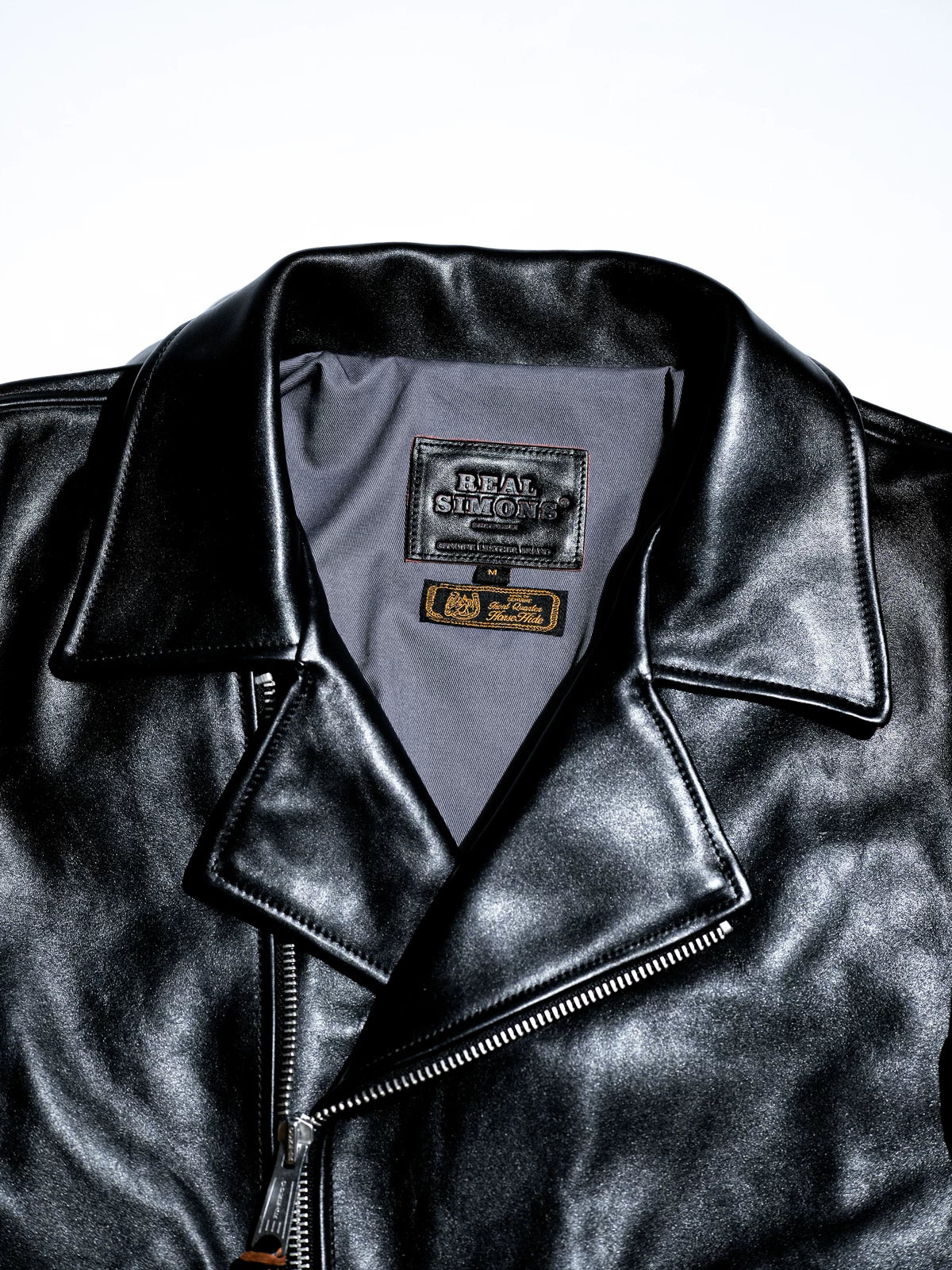 Flat lay collar open with REAL SIMONS leather patch and Great Quality Horse-Hide woven label
