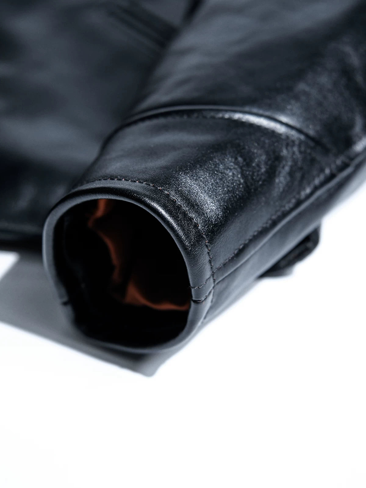 Interior of sleeve cuff showing lining edge and neat stitching