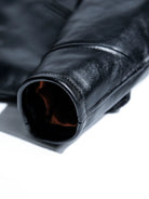 Interior of sleeve cuff showing lining edge and neat stitching