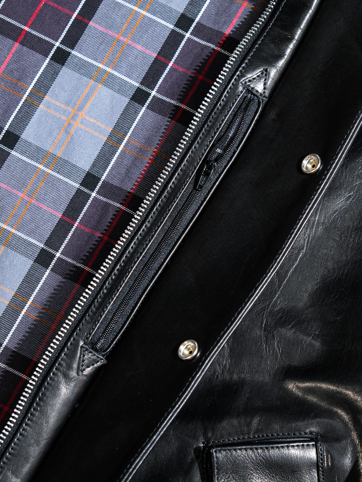 Transport jacket hardware details - MILDEX snap, IDEAL two-way zipper and tartan cotton lining