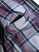 Transport jacket hardware details - MILDEX snap, IDEAL two-way zipper and tartan cotton lining