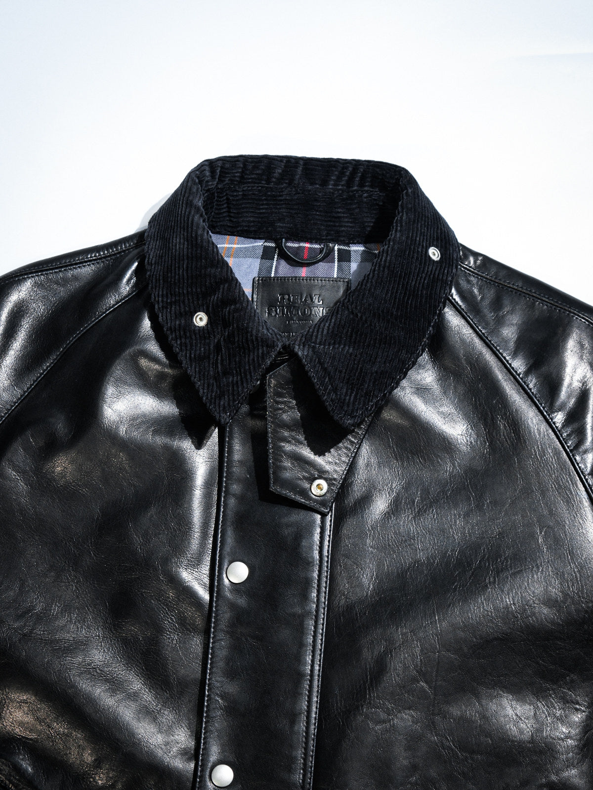 Transport jacket hardware details - MILDEX snap, IDEAL two-way zipper and tartan cotton lining