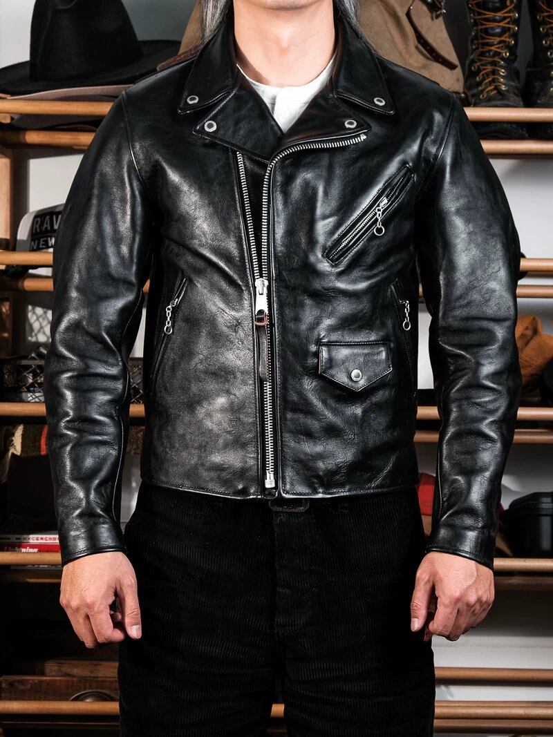 Urban riders beltless jacket in black horsehide worn with henley and corduroy pants, front view