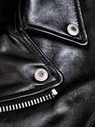 Custom 10-star SIMONS snap buttons on the black horsehide jacket