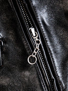 Black jacket pocket zipper with chain-style pull and ring