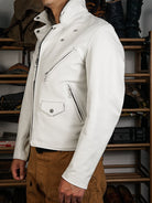 Urban riders beltless jacket in white horsehide worn with work pants, front view