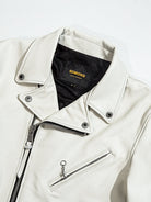 White jacket collar, snap buttons and SIMONS label detail