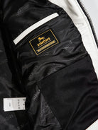 White jacket lining with Real Simons leather label and wash tag