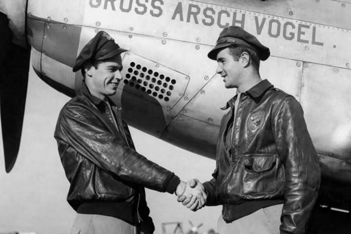 World War II US Army Air Forces pilots wearing original issue A-2 flight jackets, 1940s historical photo